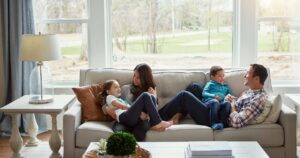 family relaxing in clean Maryland home after professional cleaning