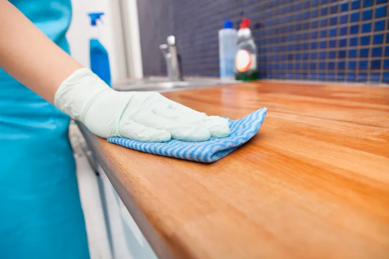 professional cleaner maintaining clean Maryland home after deep cleaning