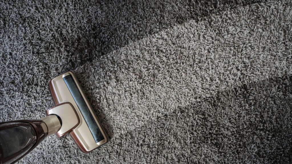 professional house cleaner vacuuming Maryland home